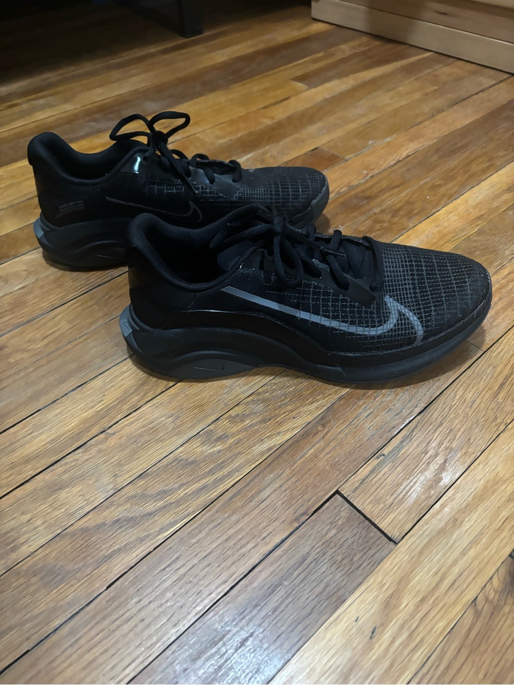 Nike Men's Black Athletic Running Sneakers with Dark Gray Swoosh